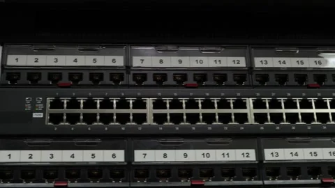 An Ethernet switch and patch panels. 库存影片 157677094
