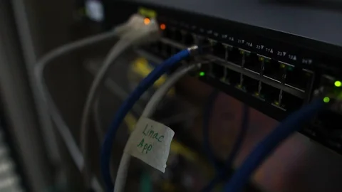 Ethernet switch. Close up. With cables, used and opened ports Stock Footage 114970208