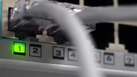 Ethernet switch. Close up. With cables, used and opened ports  Video stock 125735983