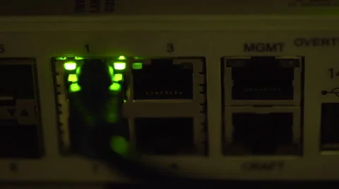 Ethernet switch traffic light blinking in a dimly lit server room 4k Stock Footage 60585211