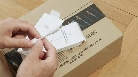 Ethernet white cable and Apple Computer Thunderbolt adapter Stock Footage 114186628