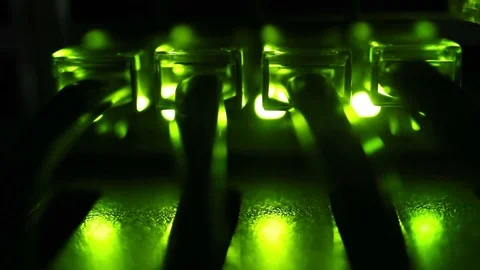 Ethernet wires in a dark space while neon green lights Stock Footage 92525107
