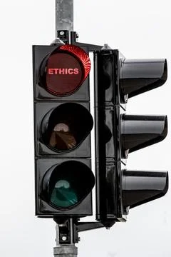 ETHICS Concept. Traffic Light with red light Stock Photos