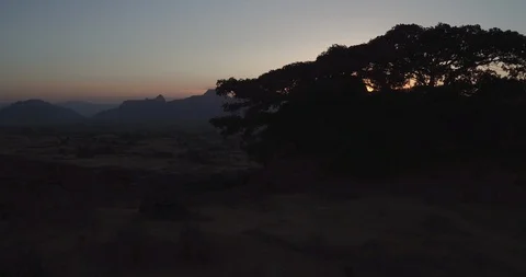 Ethiopia Aerial Tracking  over tree to simien mountains at sunrise Video stock 113879656