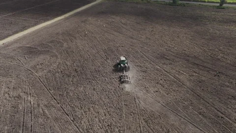 Ethiopian Farmer Plowing Fields with Tractor 2 Video stock 270942897