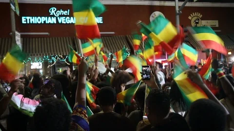 Ethiopian Flags Wave During New Years Celebration - Los Angeles, California Stock Footage 88208574