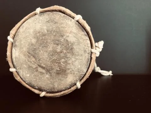 Ethnic drum on dark background Stock Photos
