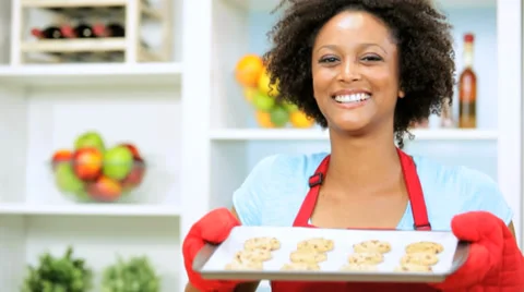 Ethnic Girl Red Apron Holding Tray Home Baked Cookies Close Up Stock Footage