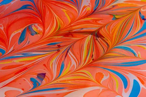 Ethnic marble abstract pattern in orange, yellow and blue colors. Unique wave Stock Photos