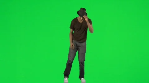Ethnic young man dancing with a hat footage Stock Footage 514423