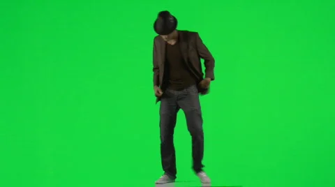 Ethnic young man dancing with a hat and a jacket footage Vidéo 514458