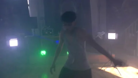Ethnic young man dancing solo nightclub scene. Stock Footage 153030431