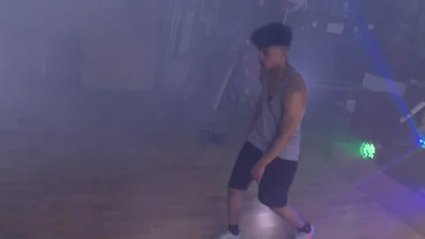 Ethnic young man practicing dancing solo. Stock Footage 153030837
