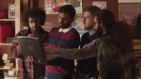 Ethnically Diverse Programmers Team Discussing Software Startup Stock Footage 263303062