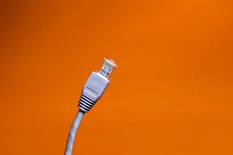 Ethrnet cable on orange backround Fotos de archivo