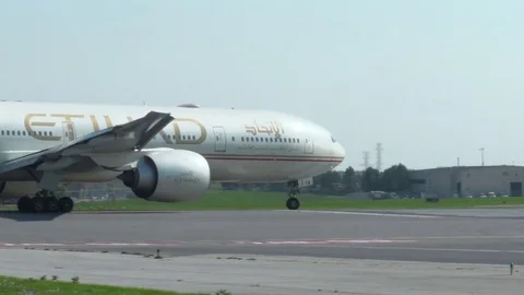 Etihad B777 Turns to the Runway Stock Footage 76233617