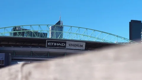 Etihad Stadium Melbourne Focus Pull From Wood to Stadium Sign Stock Footage 89747866