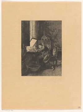 Etler at work. An etcher at work behind a table in front of the window. In... Stock Photos