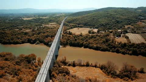 ETR 500 Freccia Rossa Train Aerial flight 4K view passes by rail Dante's bridge 스톡 동영상 196233820