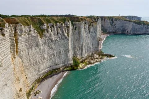 Etretat Chalk Cliffs and Pebble Beaches Above Turquoise Sea Stock Photos