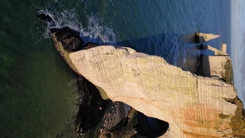 Etretat Cliffs, Alabaster Coast, Normandy, France.  Aval Arch, 4k Aerial view Stock Footage 259823865