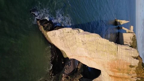 Etretat Cliffs, Alabaster Coast, Normandy, France.  Aval Arch, 4k Aerial view Stock Footage 259823879