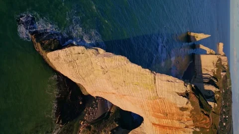 Etretat Cliffs, Alabaster Coast, Normandy, France.  Aval Arch, 4k Aerial view Stock Footage 259823886