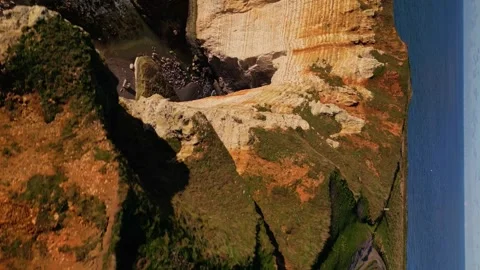 Etretat Cliffs, Alabaster Coast, Normandy, France.  Aval Arch, 4k Aerial view Stock Footage 259823890