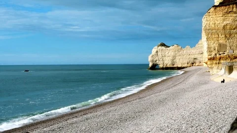 Etretat, famous cliffs and pebbly beach Stock Footage 77863470