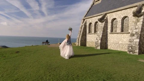 Etretat. France December 2016 Beautiful brides are photographed against the Stock Footage