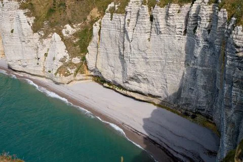 Etretat White Chalk Cliffs and Secluded Pebble Beach Stock Photos
