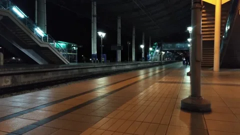 An ETS train arriving in Ipoh station at night, Perak, Malaysia Stock Footage 155803506