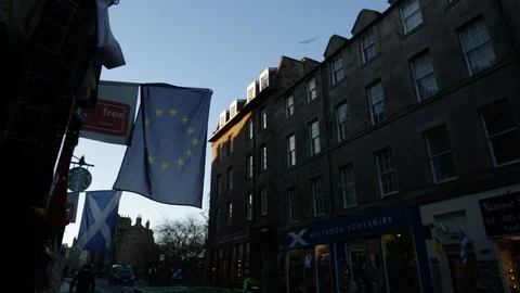 EU and Scottish flags on Royal Mile, Edinburgh Video stock 98975819