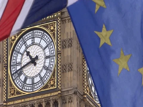 EU and UK flags are waving in front of Big-Ben, London, UK Video stock 75536485