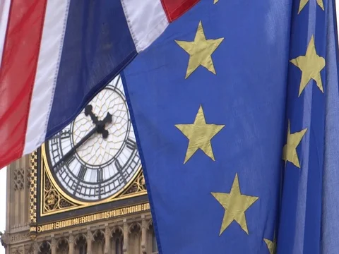 EU and UK flags are waving in front of Big-Ben, London, UK Video stock 75536489