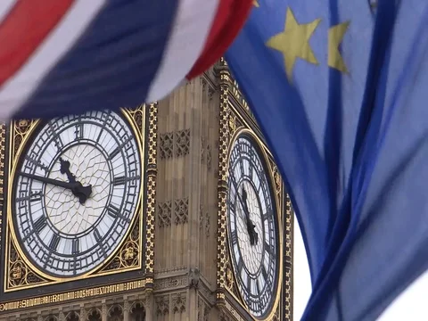 EU and UK flags are waving in front of Big-Ben, London, UK Video stock 75536699