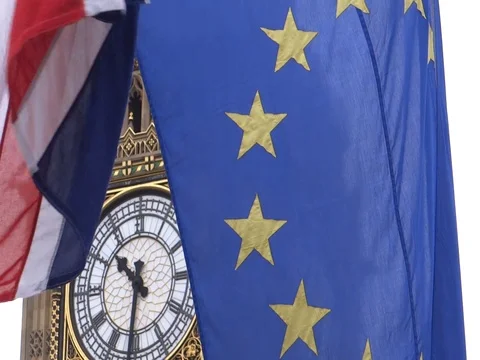 EU and UK flags are waving in front of Big-Ben, London, UK Video stock 75642845