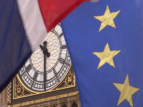 EU and UK flags are waving in front of Big-Ben, London, UK Video stock 75642848