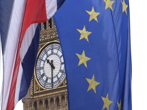EU and UK flags are waving in front of Big-Ben, London, UK Video stock 75642850