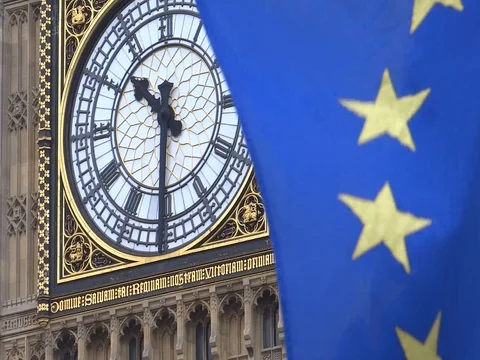 EU and UK flags are waving in front of Big-Ben, London, UK Video stock 75642851