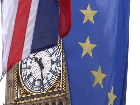 EU and UK flags are waving in front of Big-Ben, London, UK Video stock 75642854