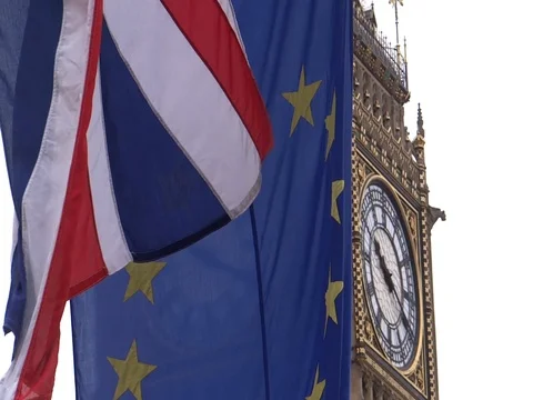 EU and UK flags are waving in front of Big-Ben, London, UK Video stock 75642855