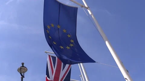 EU and UK flags in the Blue sky Stock Footage 62933358