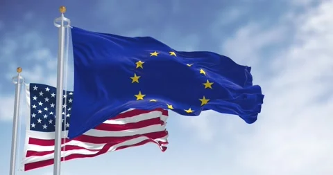 EU and USA flags waving on flagpoles against clear blue sky outdoors Stock-Footage 304615721