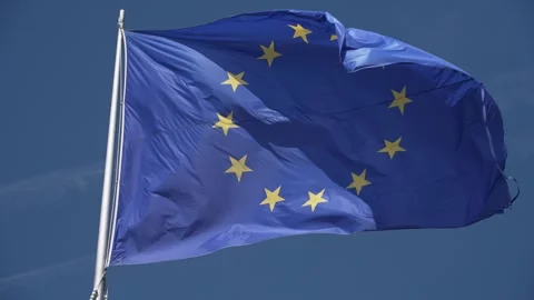 EU Flag Against Blue Sky, European Union Flag Waving in the Wind in Slow Motion Video stock 311396703