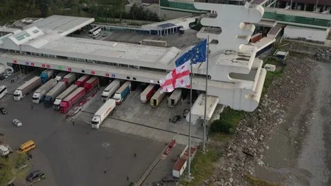 EU flag  and Georgia on the border of Georgia Turkey with drone Stock Footage 151266285