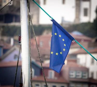 EU Flag on City Background Stock Photos