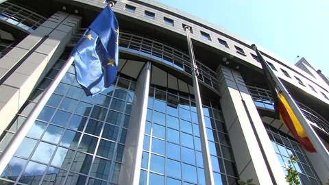 EU flag in front of EU building Brussels Stock Footage 128902328