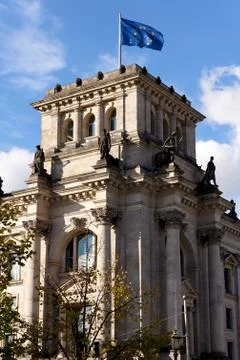 EU Flag Streaming over the German Parliament at Berlin Stock Photos