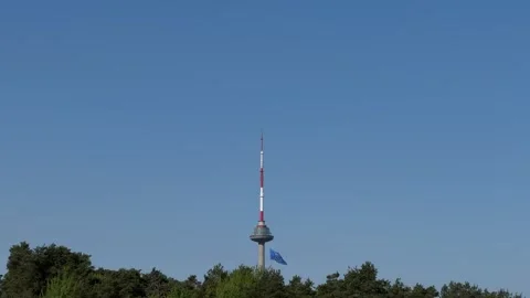 EU flag waving on TV Tower in Vilnius, Lithuania Stock Footage 274650963